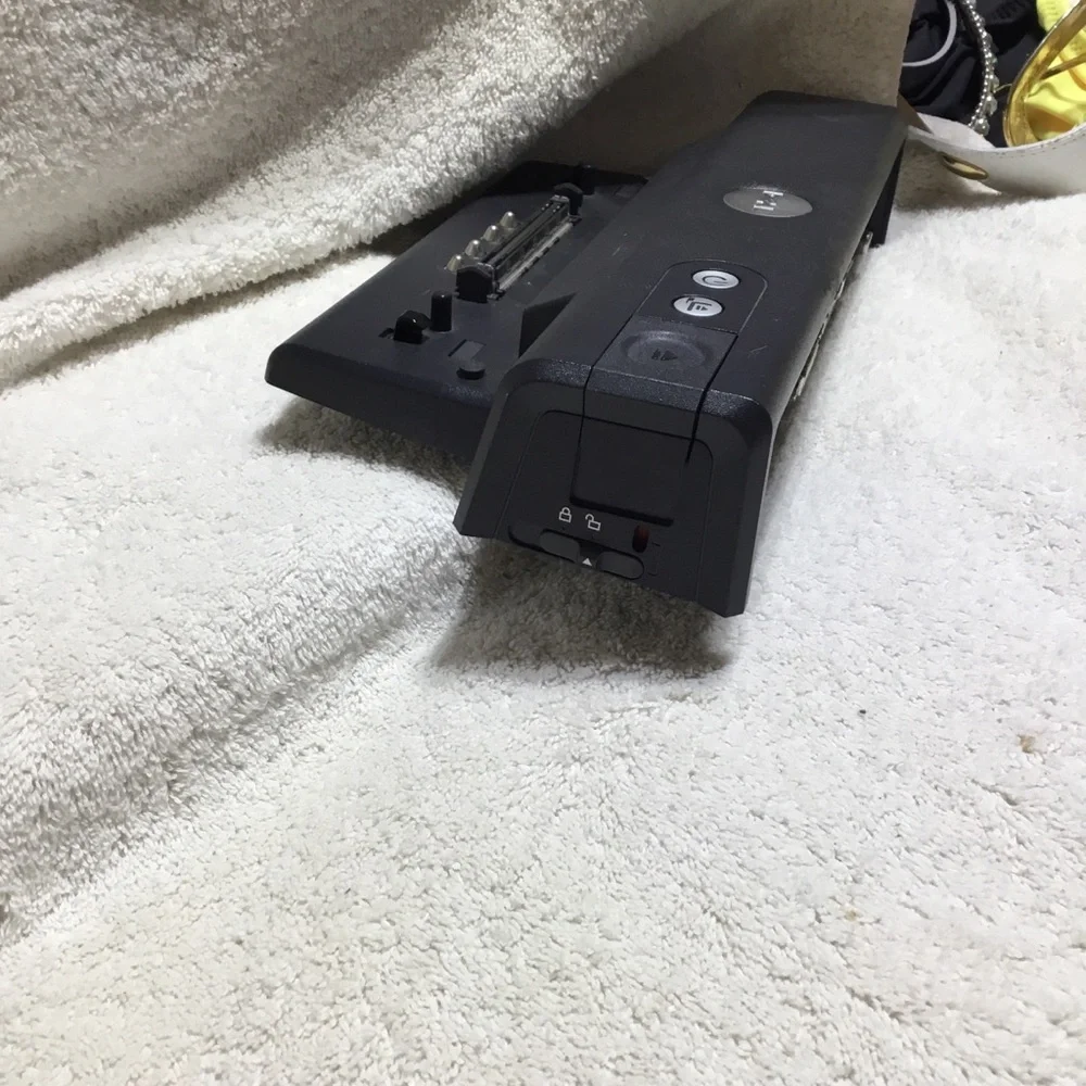 Dell Pro 1X laptop base station, charges and keeps attachments connected